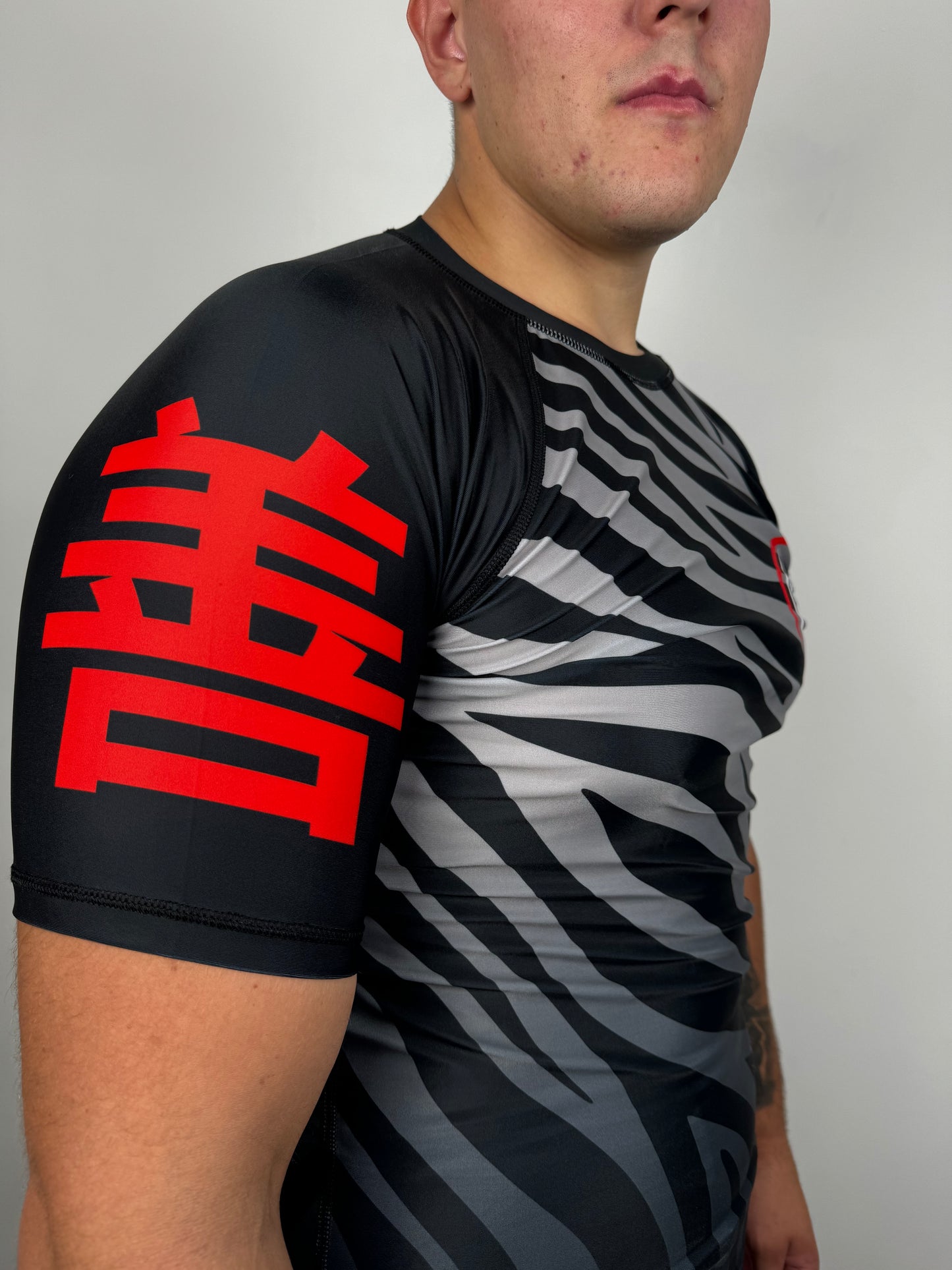 Zebra Strike Rash Guard